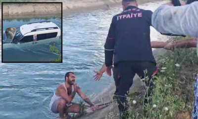 Arabayla sulama kanalına uçtu, yardımları reddetti